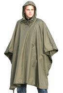 Man wearing olive green waterproof military-style ripstop rain poncho with hood for outdoor protection