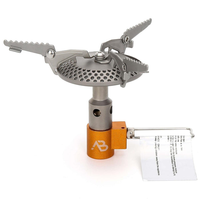 Réchaud à gaz de camping léger en titane A.Blochl AB-16 avec flamme réglable et supports de casseroles robustes pour le trekking.