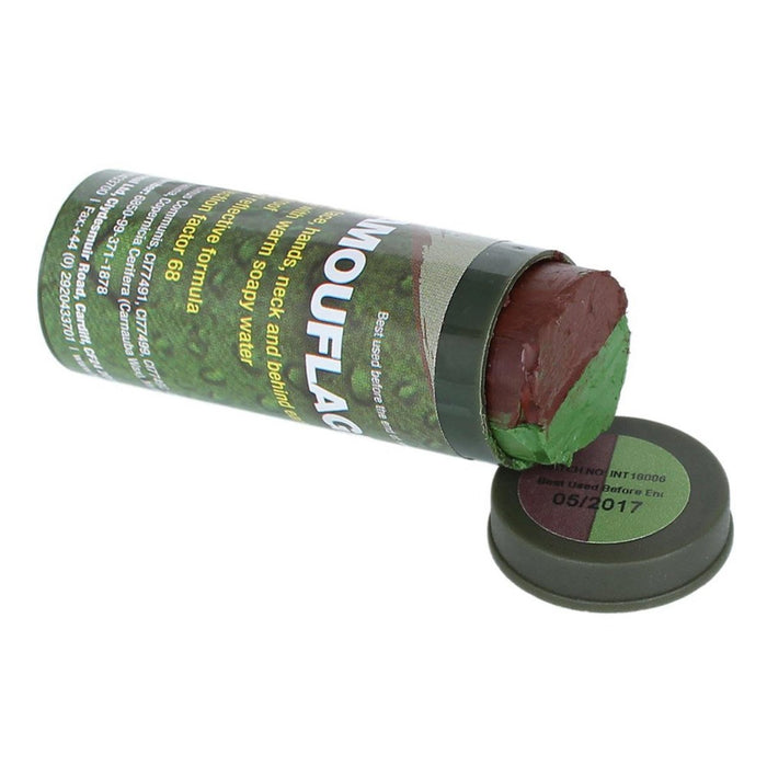 Bâton de peinture Mouf lac dans un tube vert avec un capuchon marron sur fond blanc