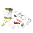 Collection of survival tools and items on a white background