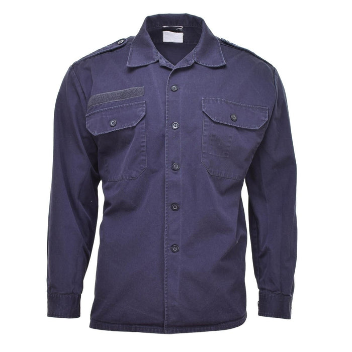 Chemise à manches longues de l'armée hollandaise bleu marine avec poches boutonnées, poignets et épaulettes, veste de surplus militaire.