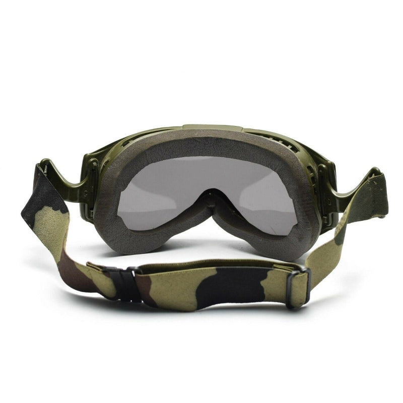 Genuine French army tanker goggles with padded foam, adjustable camouflage strap, and smoke lens for sun, sand, wind protection.