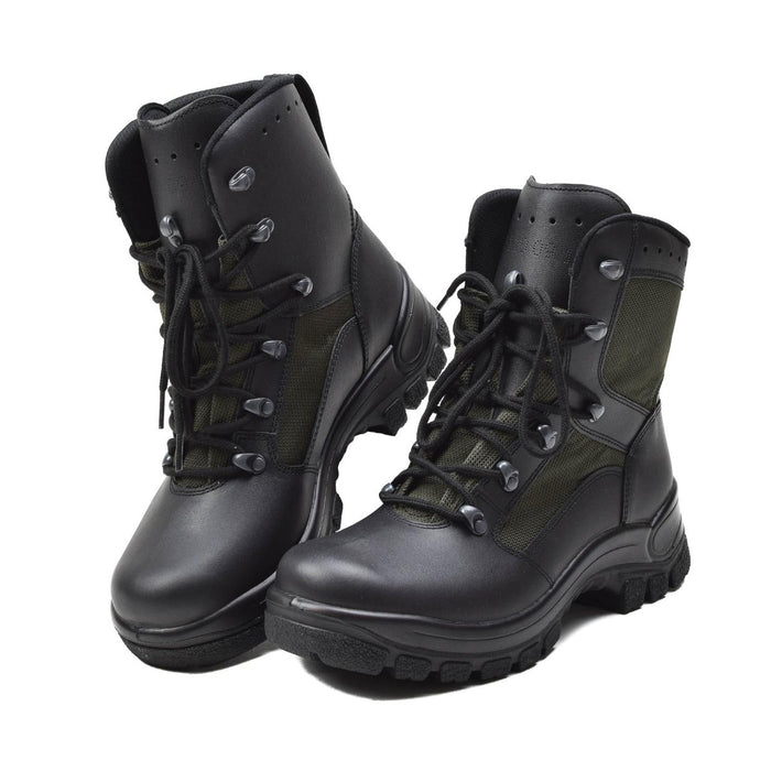 Paire d'authentiques bottes de combat militaires allemandes en cuir et textile noir à laçage rapide et semelles antidérapantes