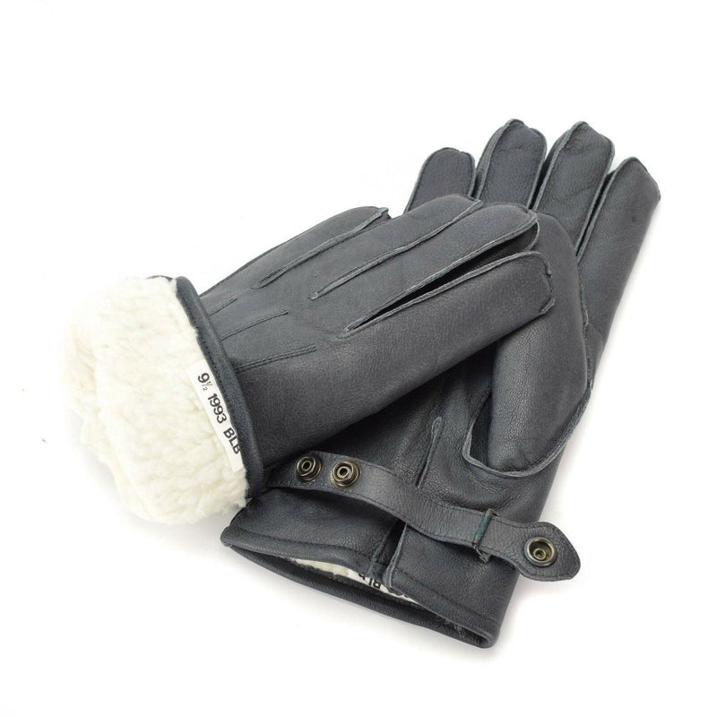 Pair of genuine German Police grey leather gloves with wool lining and button strap for winter warmth and durability