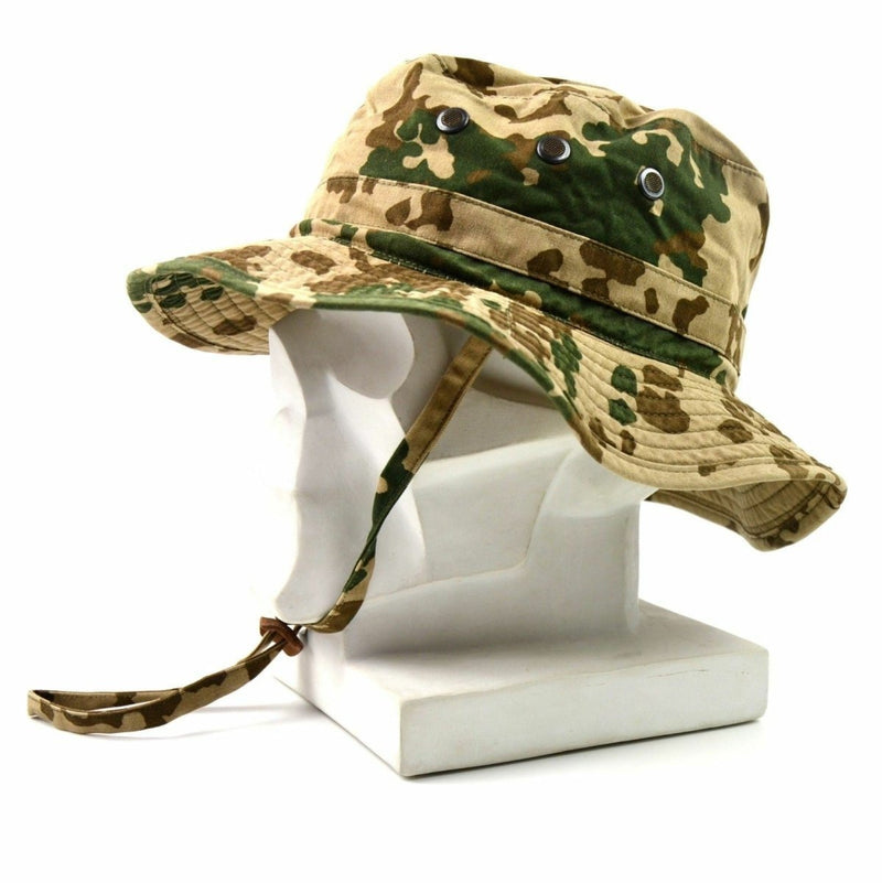 Genuine original German Army boonie hat in desert camouflage with wide brim and chin strap for tactical use