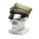 Genuine Polish military officer's peaked cap in olive with eagle insignia and adjustable chinstrap on mannequin head.