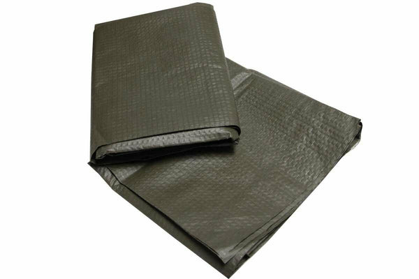 Folded olive drab German Army waterproof groundsheet tarpaulin for camping and outdoor protection