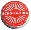 Round red tin can of German SCHO-KA-KOLA dark chocolate with caffeine and cola nut energy boost.