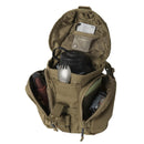 Helikon-Tex Essential Kit Bag in tan with open compartments showing organized bushcraft gear and utensils inside