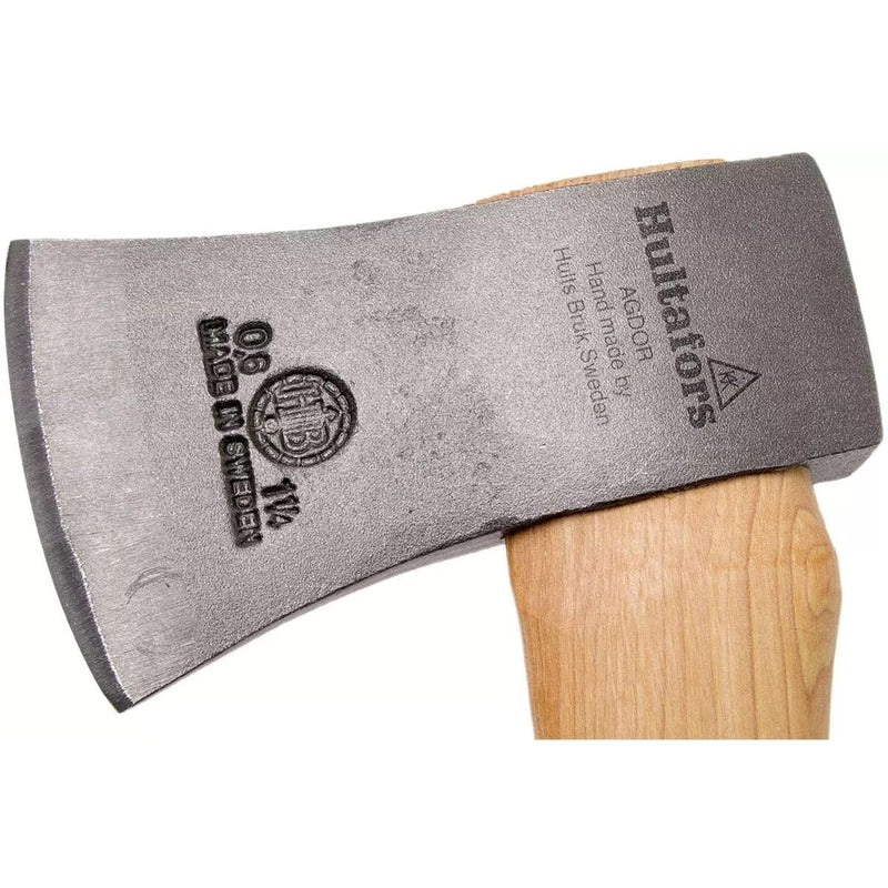 Close-up of HULTAFORS H006SV hand forged carbon steel axe head with durable hickory wood handle