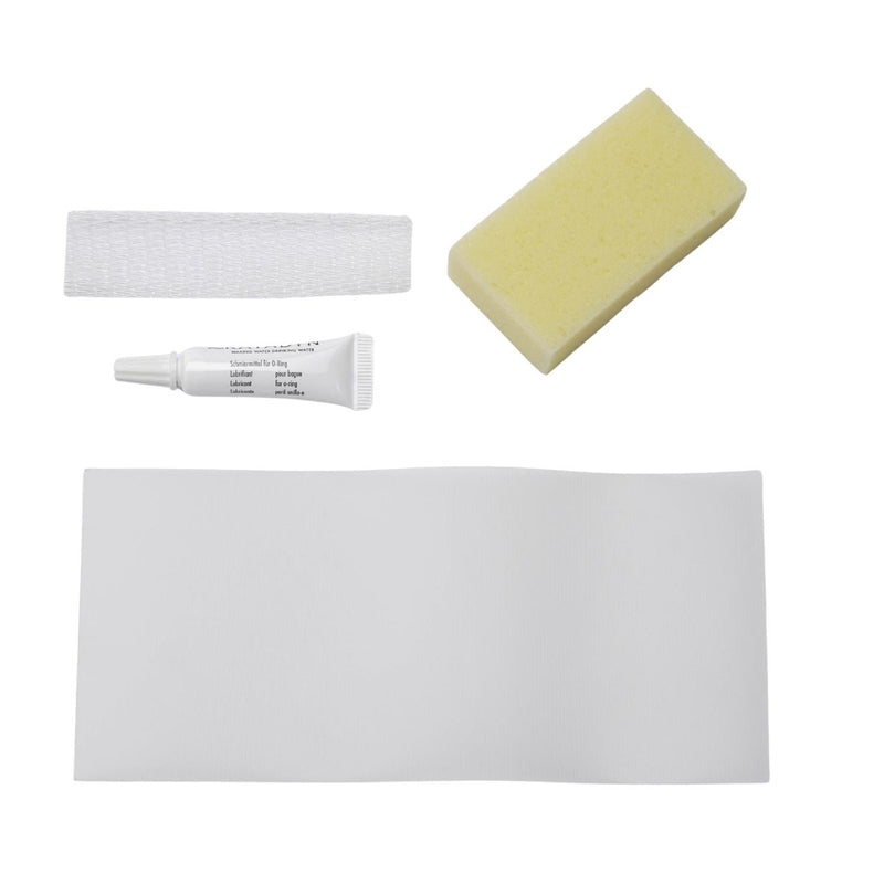 Katadyn Hiker Pro water filter replacement set including mesh, silicone lubricant, sponge, and filter cloth parts laid out.