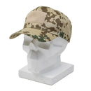 Tropentarn camouflage military baseball cap with peaked brim displayed on white mannequin head.