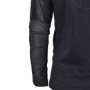 Close-up of Mil-Tec black tactical combat shirt sleeve with reinforced elbow padding and breathable fabric details.
