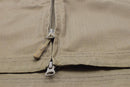 Close-up of Mil-Tec coyote brown ripstop fabric jacket zipper with branded pull tabs and durable stitching detail
