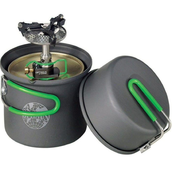 Système de cuisson solo compact OPTIMUS CRUX Lite avec poignée verte pour une cuisine légère en camping et en randonnée en plein air.