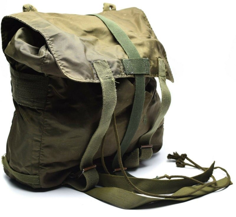 Original Austrian Army olive green combat day pack with buckle closure and adjustable carrying strap vintage military bag