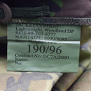 Close-up of size and contract label on a British Army lightweight woodland combat jacket in DPM camouflage pattern