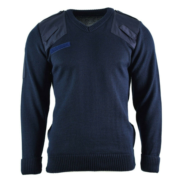Navy blue British army police Commando Jumper sweater with V-neck, reinforced shoulders, and ribbed cuffs and waist.