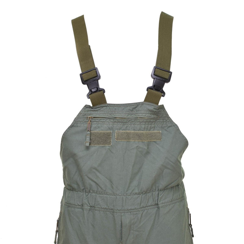Olive green original Czech Army flame-resistant aramid bib pants with adjustable straps and zippered chest pocket