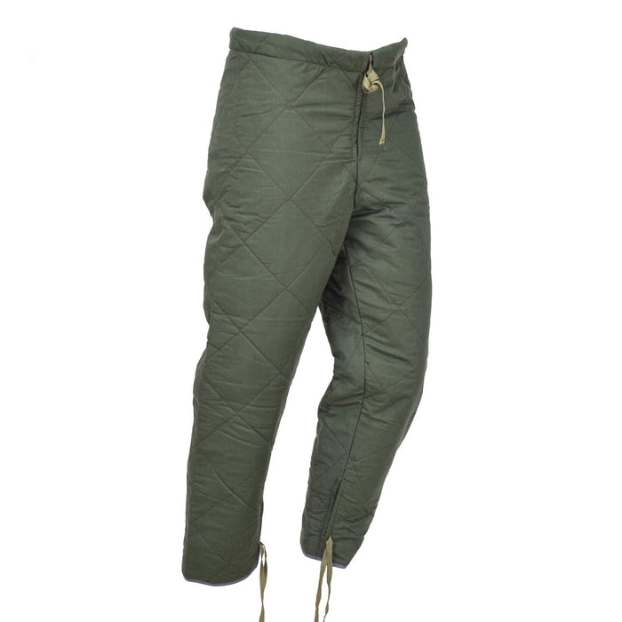 Pantalon d'hiver thermique vert olive original de l'armée tchèque avec taille réglable et cordon de serrage aux chevilles pour plus de chaleur.