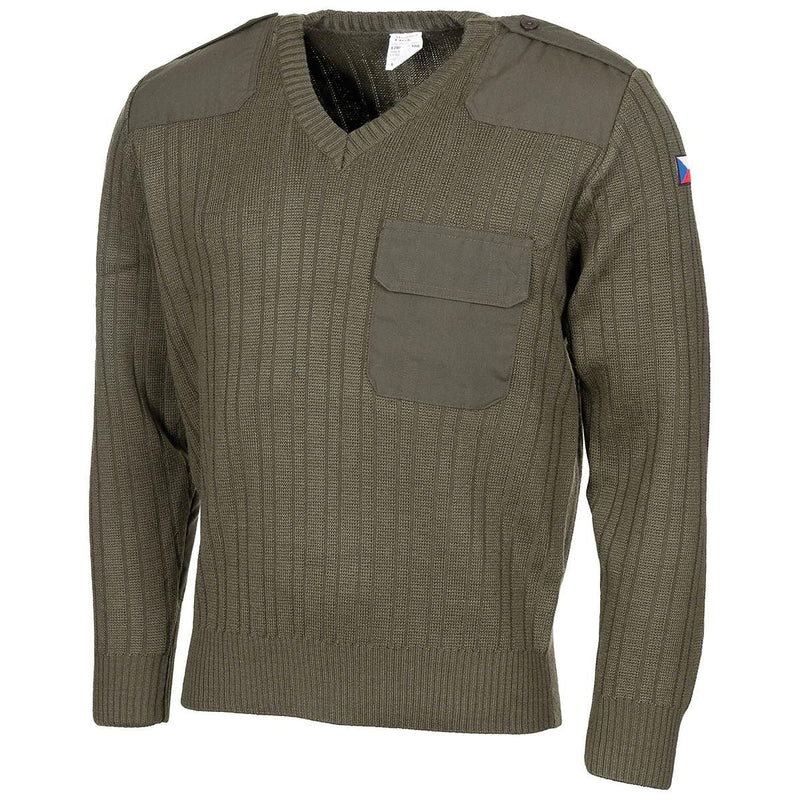 Olive drab Czech army wool sweater with V-neck, reinforced elbows, shoulder patches, and Czech flag on arm.