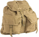 Vintage Czech M60 military rucksack in tan canvas with metal buckles and multiple front pockets for outdoor use.