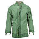 Green original Dutch army M65 waterproof military parka jacket with trilaminate lining, designed for extreme weather protection.