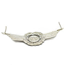 Original East German NVA officer military cap cockade pin badge with detailed wreath and winged design in silver tone