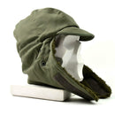 Original French army winter paratrooper hat in olive green with fold-down insulated earflaps for cold weather protection.