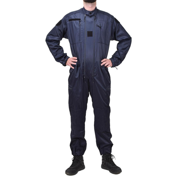 Full-length blue anti-static French police officer coverall with multiple pockets and elastic cuffs worn by standing person