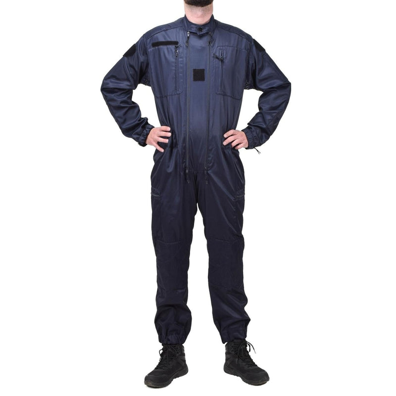 Full-length blue anti-static French police officer coverall with multiple pockets and elastic cuffs worn by standing person