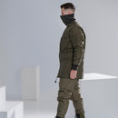 Side view of a man wearing an olive green original German army field jacket parka quilt liner winter jacket