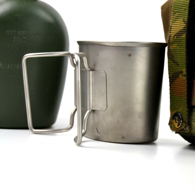 Original Netherlands Dutch Army canteen with metal cup and camouflage fabric cover on white background
