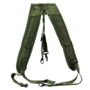 Original U.S. Army green webbing suspenders designed for comfort and load distribution in military use.