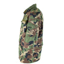 Original vintage Slovakian army field jacket M97 camo military combat parka with chest and arm pockets shown from side view.