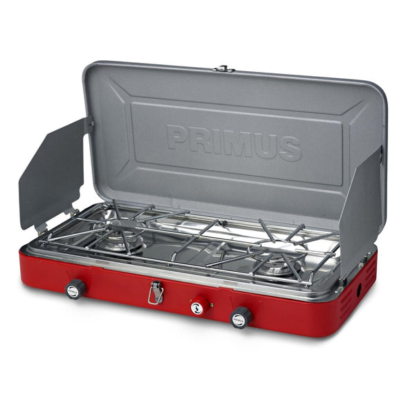 Primus Atle II portable dual burner camping stove with windshields and easy propane setup for outdoor cooking