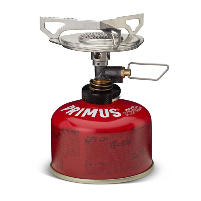 Réchaud de camping compact Primus Essential Trail DUO avec réservoir de carburant pour une cuisson et une ébullition rapides en plein air.