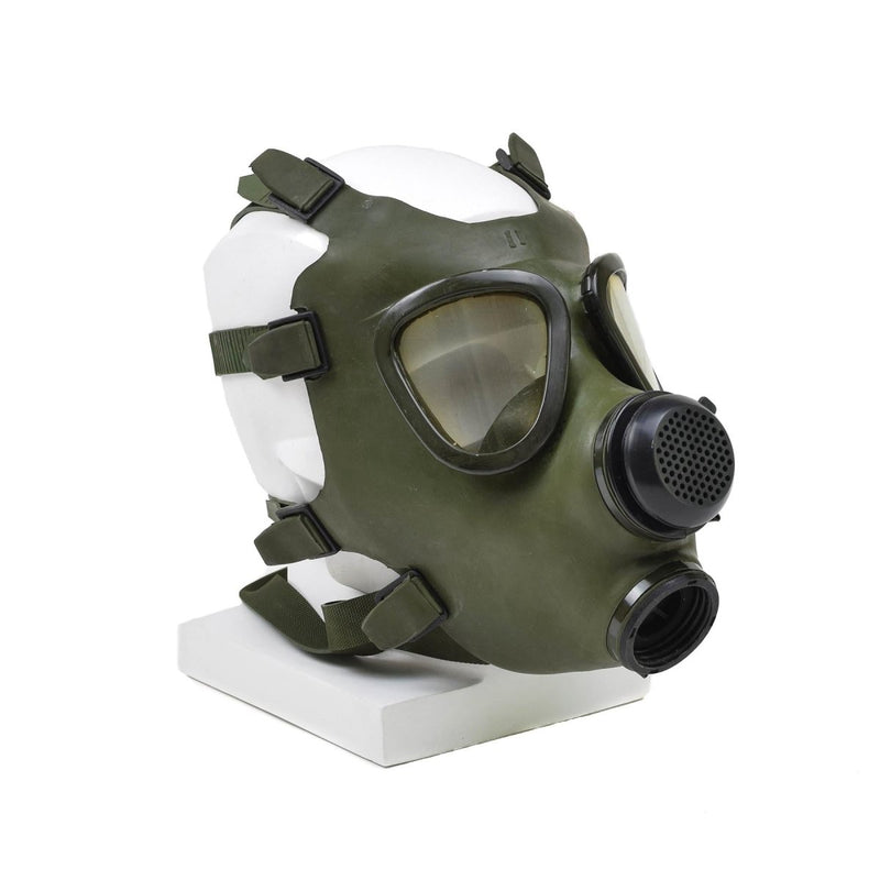 Romanian M74 olive green full face gas mask NBC respirator with adjustable straps and dual eyepieces on white mannequin head