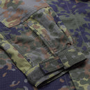 Close-up of TACGEAR Flecktarn camo jacket sleeve with ripstop fabric and adjustable cuff detail.